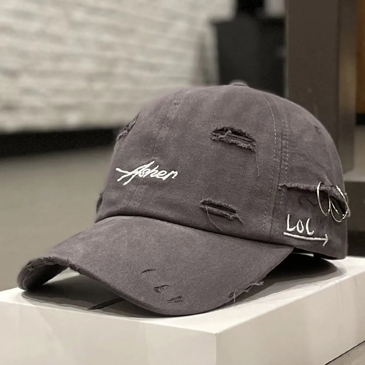 Asher Embroidered Perforated Iron Ring Unisex Baseball Cap