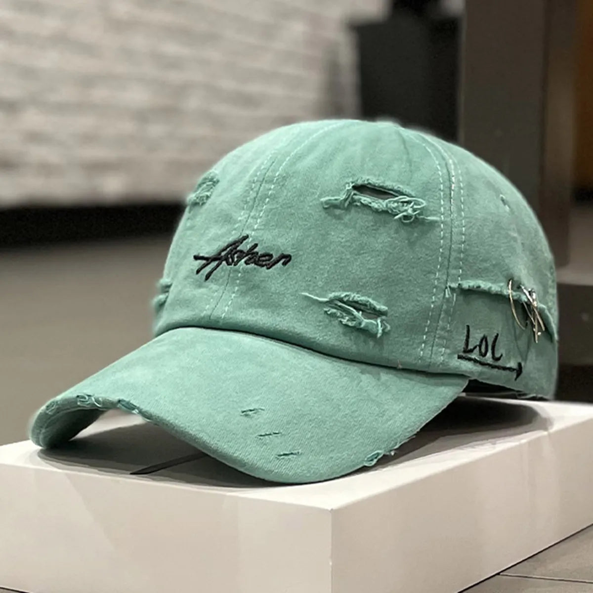 Asher Embroidered Perforated Iron Ring Unisex Baseball Cap
