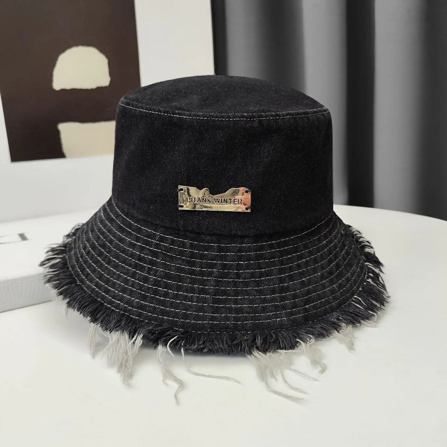 Washed Denim Tassel Wide Brim Bucket Hat